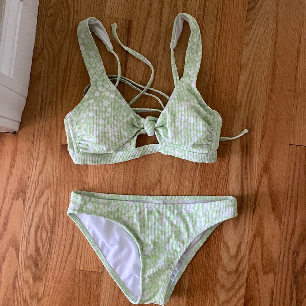 Green patterned target bathing suit.